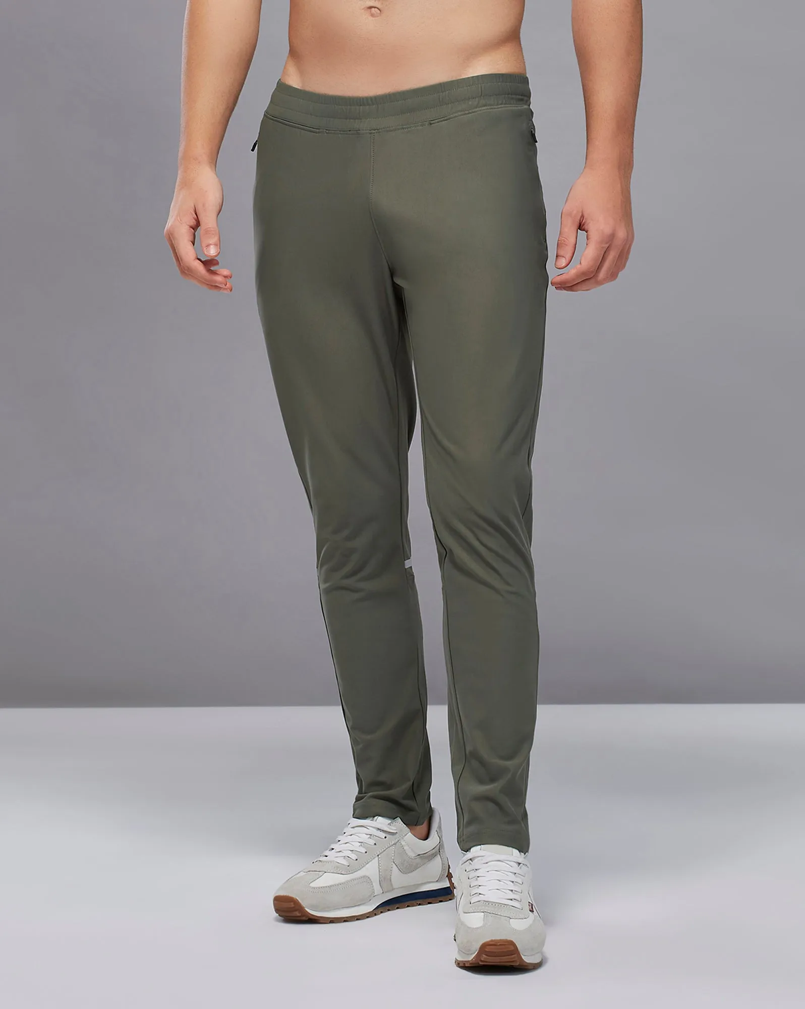 Sporty Support Flexible Waistband Men Solid Slim Fit Sports Trackpants with DURACOOL 