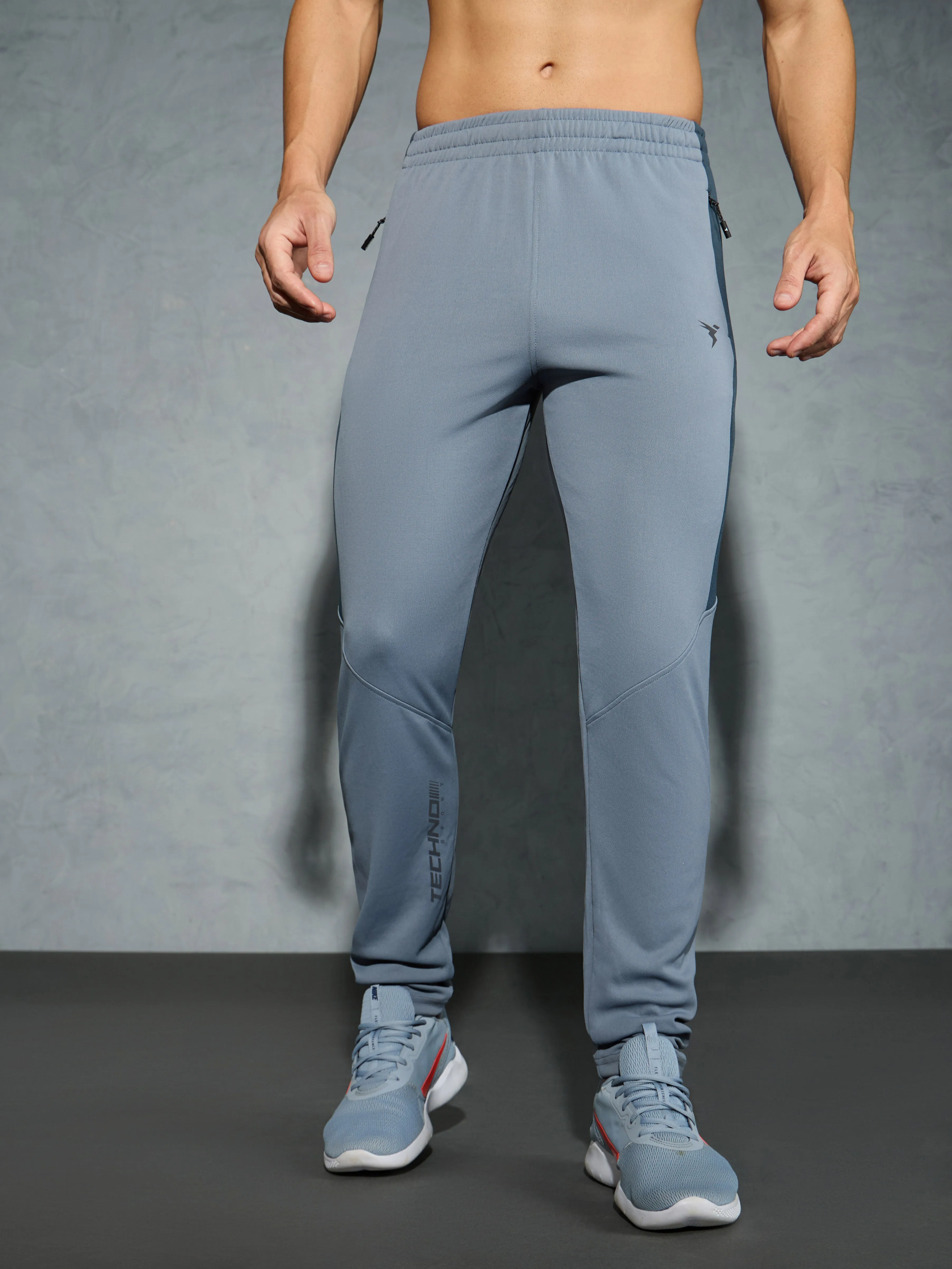 Comfort Layer Men Solid Slim Fit Trackpants with TECHNO DRY