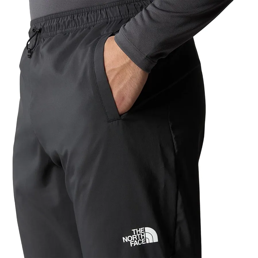 The North Face pantalone sportivo da uomo Wind Track NF0A87J60C5 grigio asfalto Sporty Look MoistureLockTechnology
