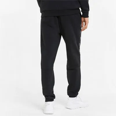 Puma pantalone in felpa con banda laterale e polsino al fondo ESS  Tape Sweatpants FL cl 849042 01 black Training efficiency